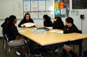 Read 180 teacher, Ms. Perez, is helping her students to have a better understanding