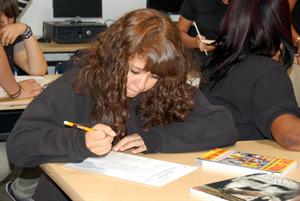 Freshmen Paula Chavez working in Catherine Perezs reading class. 