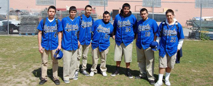 READY! Baseball players pose for a picture before a game. From left to right: Javier Ibarra, Eddie Valdez, Juan Gomez, Jaime Palacios, Andres Cervantes, Miguel Sanchez, and Raul Mora.