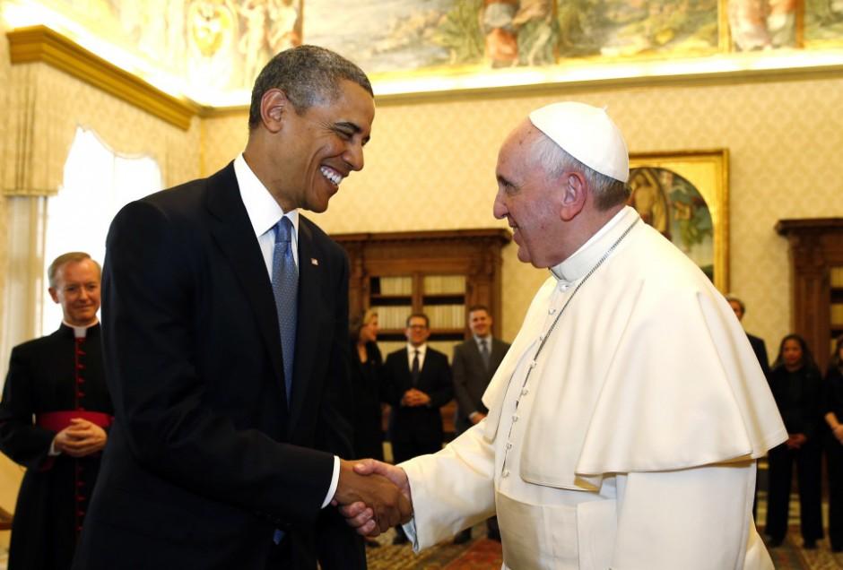 U.S. President Barack Obama shakes hands with Pope Francis (R) during their meeting at the Vatican March 27, 2014. Obamas first meeting on Thursday with Pope Francis was expected to focus on the fight against poverty and skirt moral controversies over abortion and gay rights.