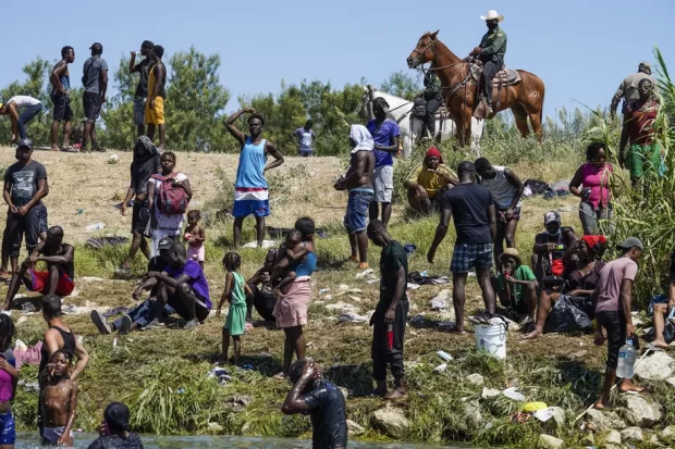  Haitian migrants on the Ciudad Acuña side of the border:(Image taken Paul Ratje for Getty images.)
