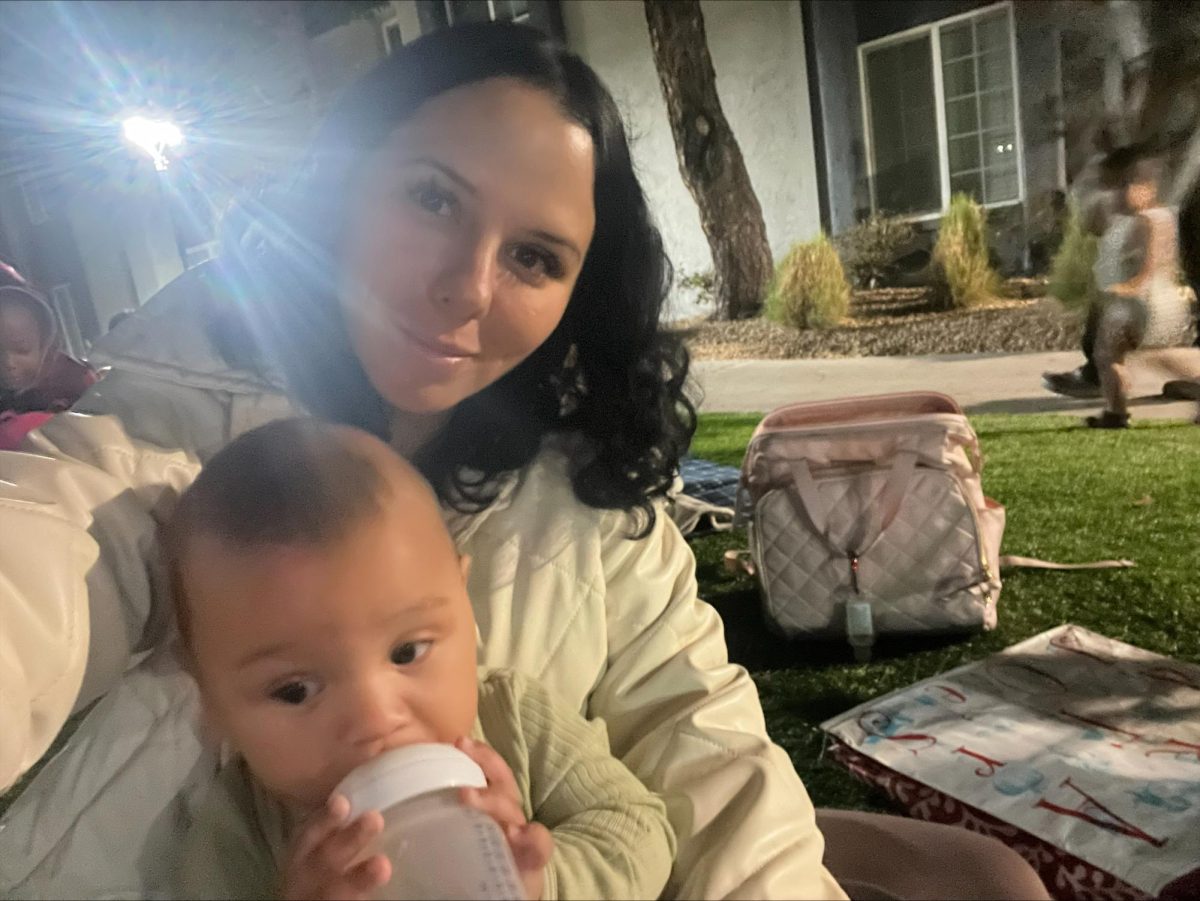 Ms. Velazquez enjoys a evening on her lawn with her baby Ramsey Lionel 