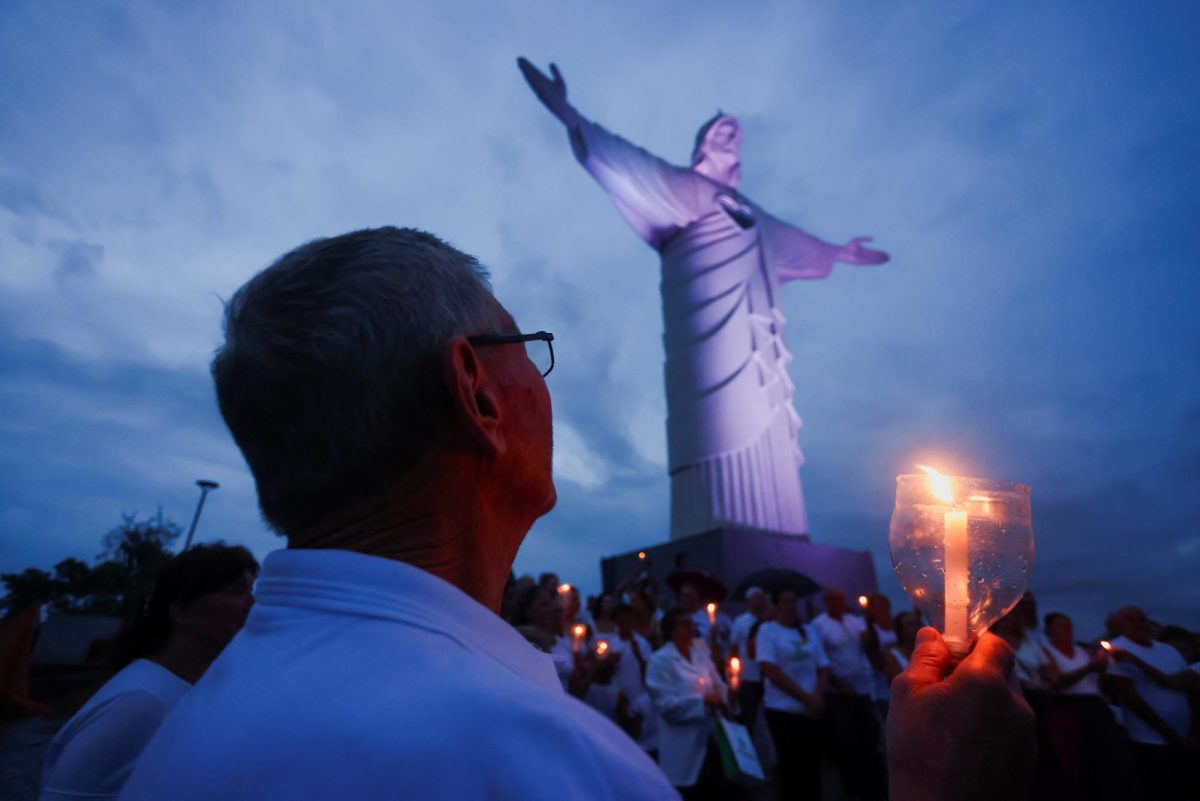 People attend a prayer service near the Christ the Protector statue, while Pope Francis continues his hospitalization, in Encantado, state of Rio Grande do Sul, Brazil February 27, 2025. REUTERS/Diego Vara/ File Photo