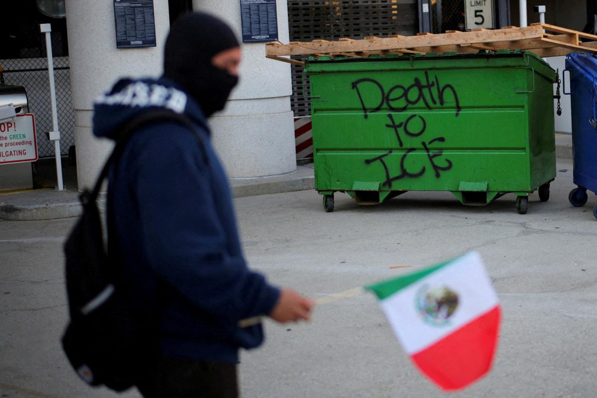 "Death to ICE" is written on a garbage cart following multiple detentions by Immigration and Customs Enforcement (ICE), in downtown Los Angeles, California, U.S., June 6, 2025. REUTERS/Daniel Cole