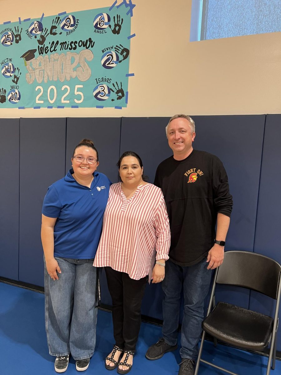 Ms. Stephanie poses with Ms. Avila and Mr. Reed